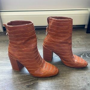 Brown snake skin boots